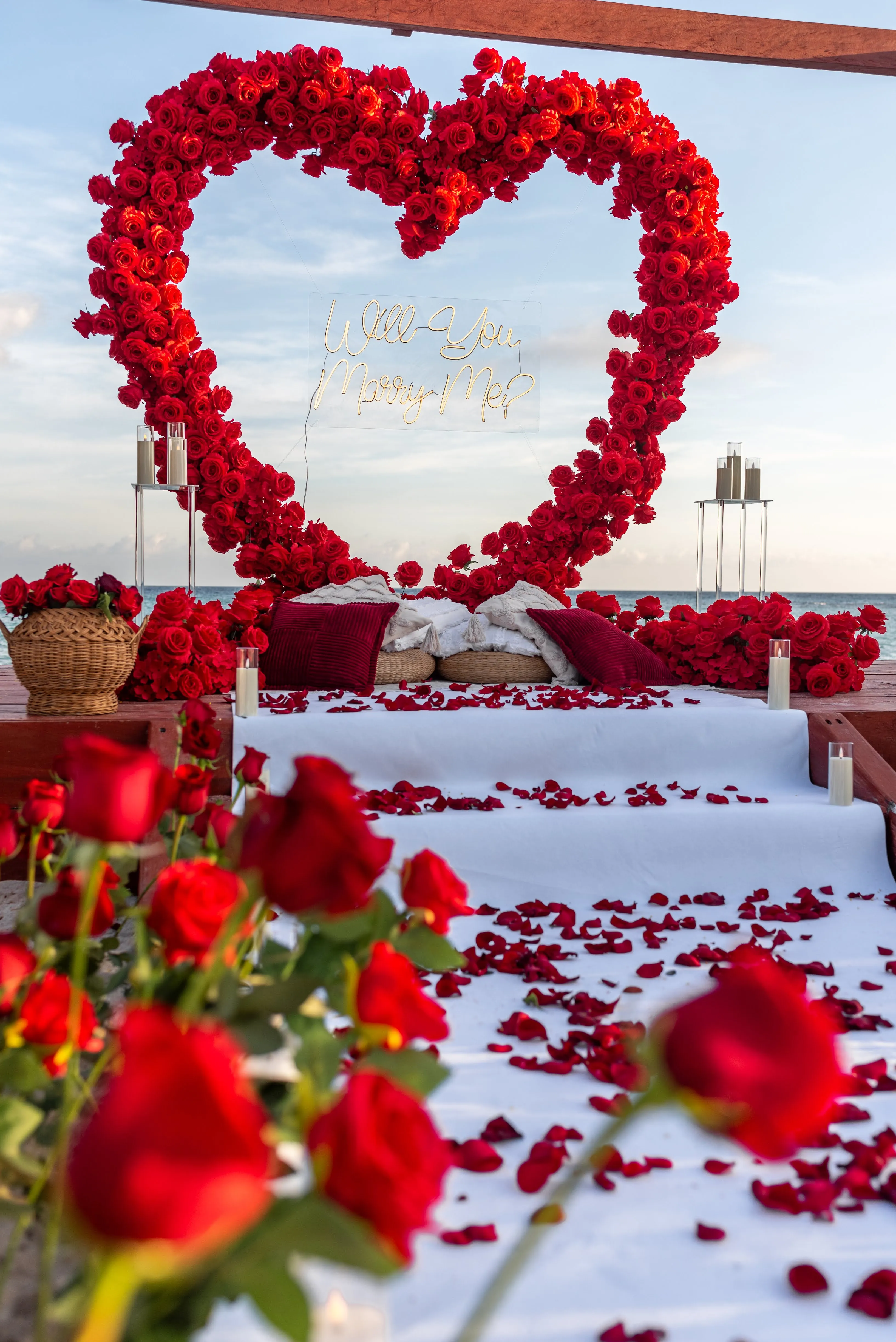 Beach proposal with floral decorations