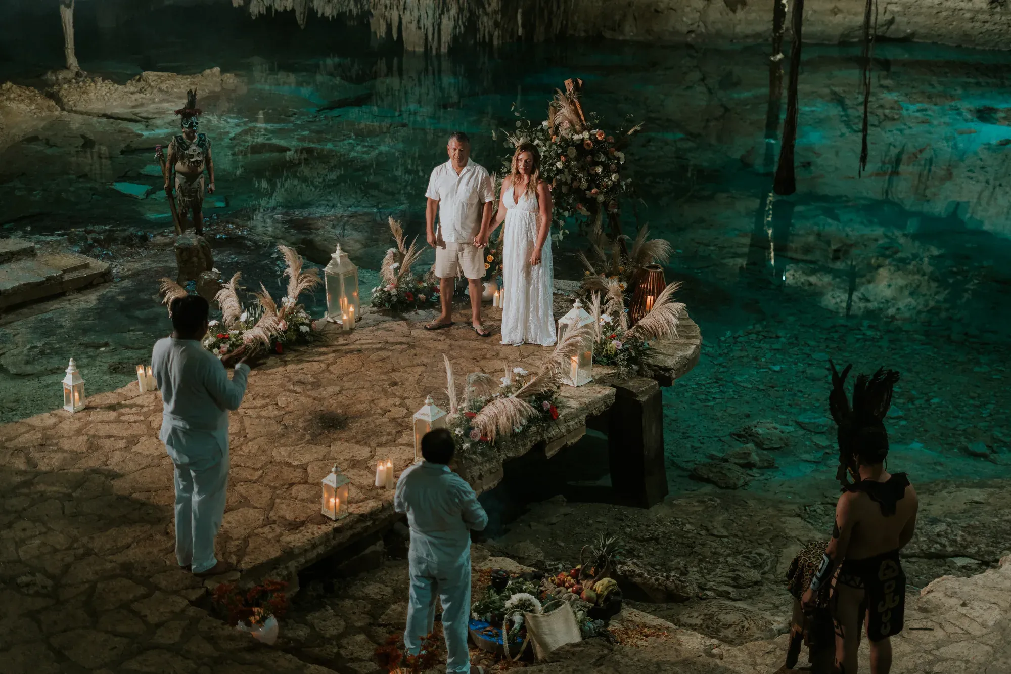 Couple during a private Mayan ceremony in a cenote