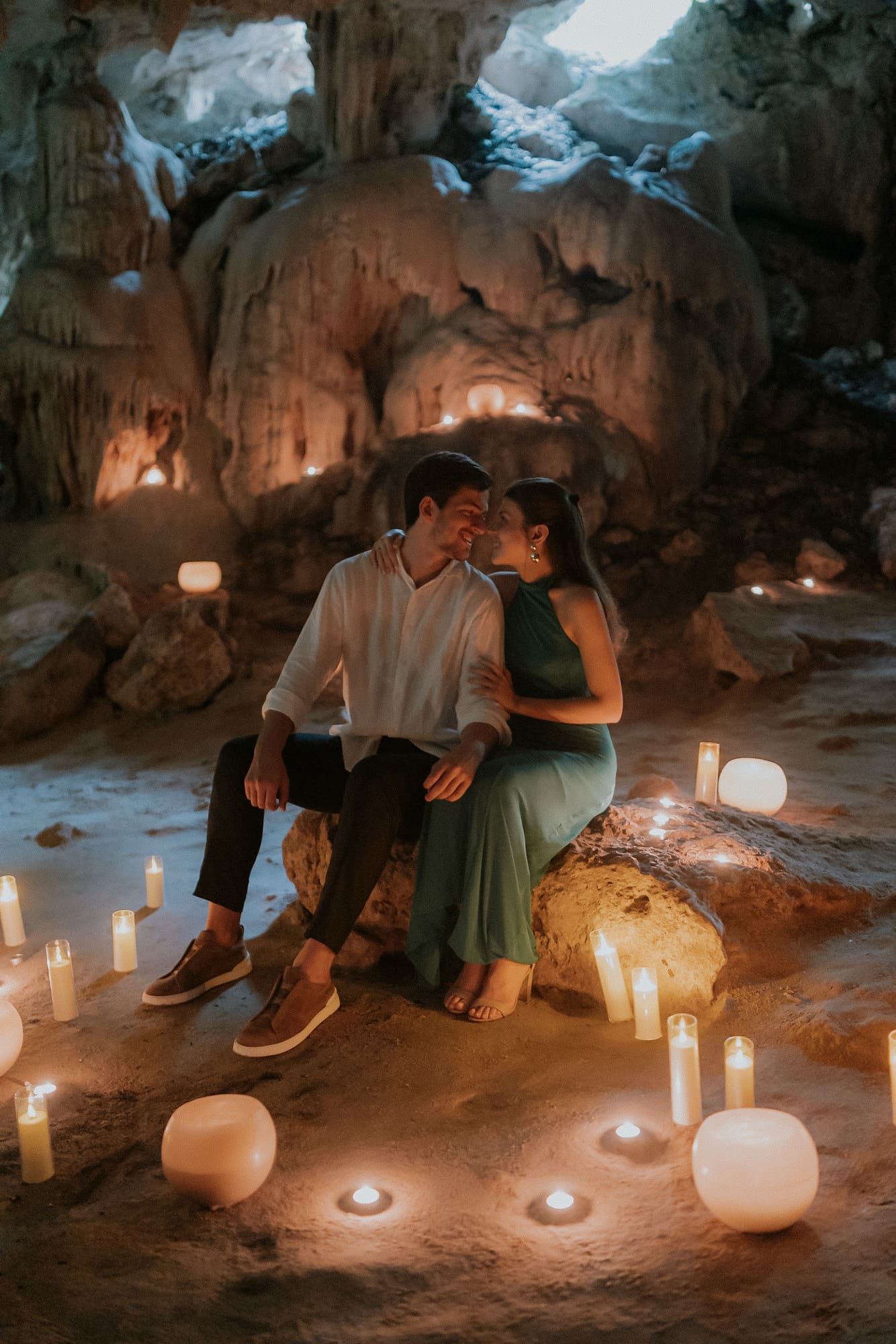 Romantic limestone cave setting in Playa del Carmen for a marriage proposal, featuring natural light and a secluded, intimate ambiance.